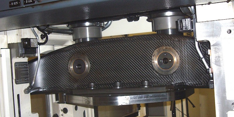 Lightweight ram of a high-speed stamping press made of carbon fiber reinforced polymers